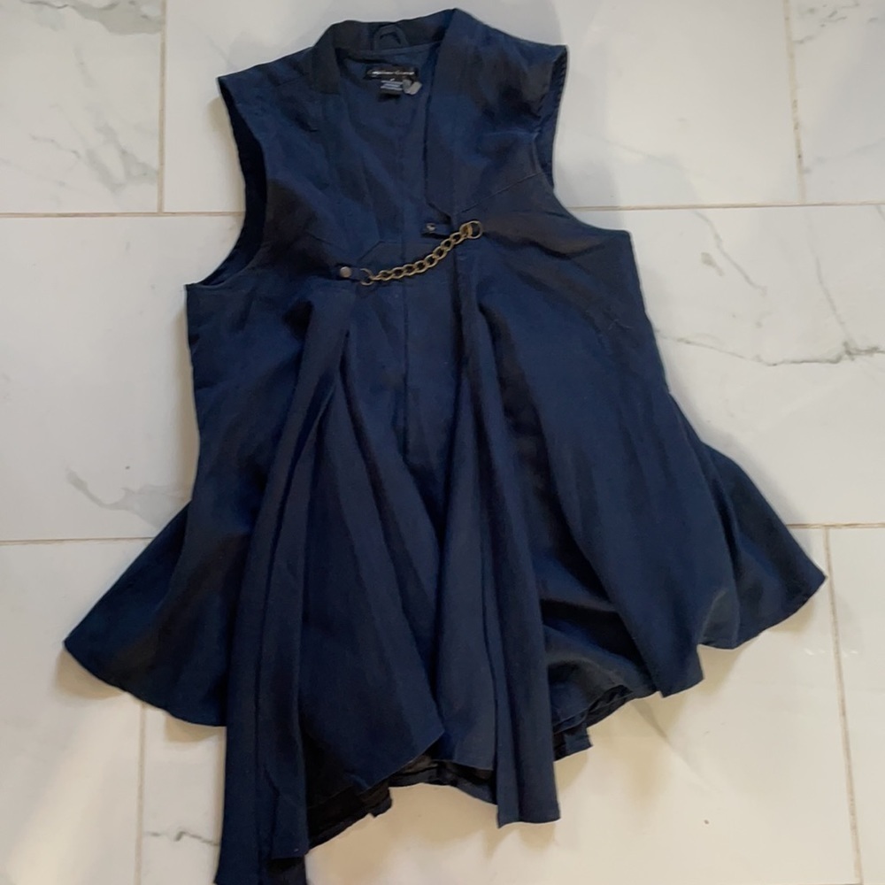 Blue suede ruffled vest
